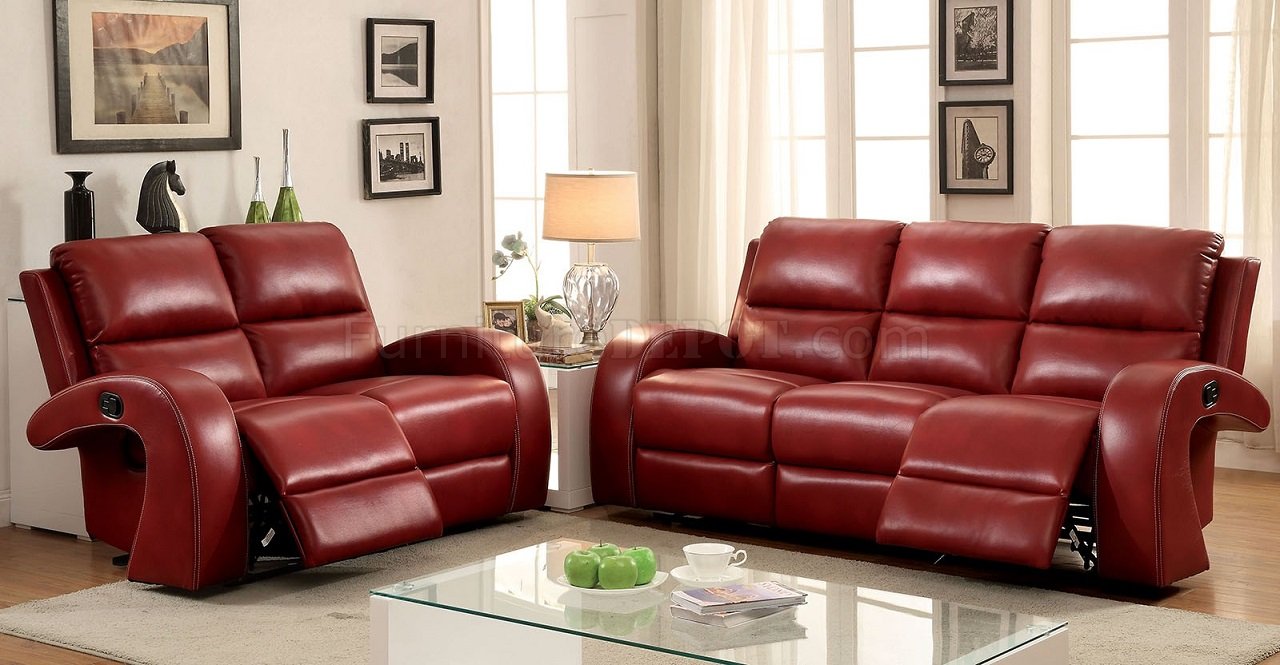 red leather reclining sofa