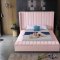 Kiki Upholstered Bed in Pink Velvet Fabric by Meridian