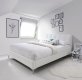 Leona Upholstered Platform Bed in White by J&M