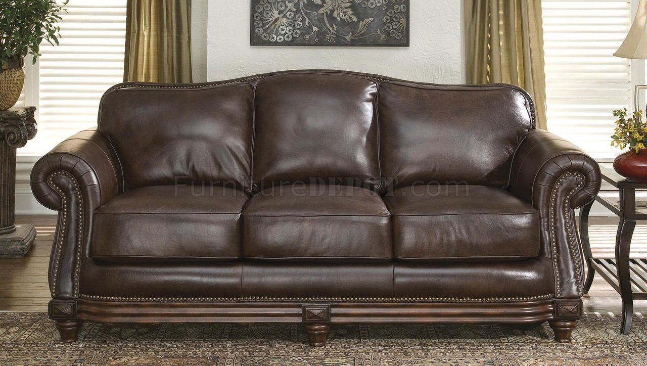 dark brown leather sofa with nail head trim