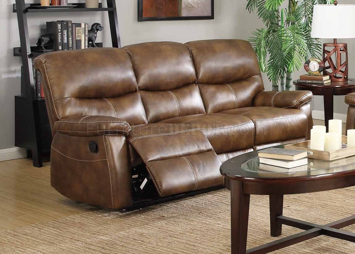 weathered brown leather sofa
