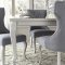 Coralayne Dining Table D650 in Metallic by Ashley w/Options