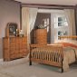 Medium Oak Elegant Bedroom with Curved Sleigh Bed